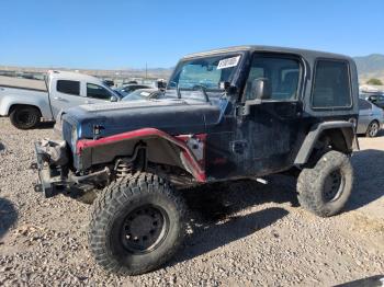  Salvage Jeep Wrangler